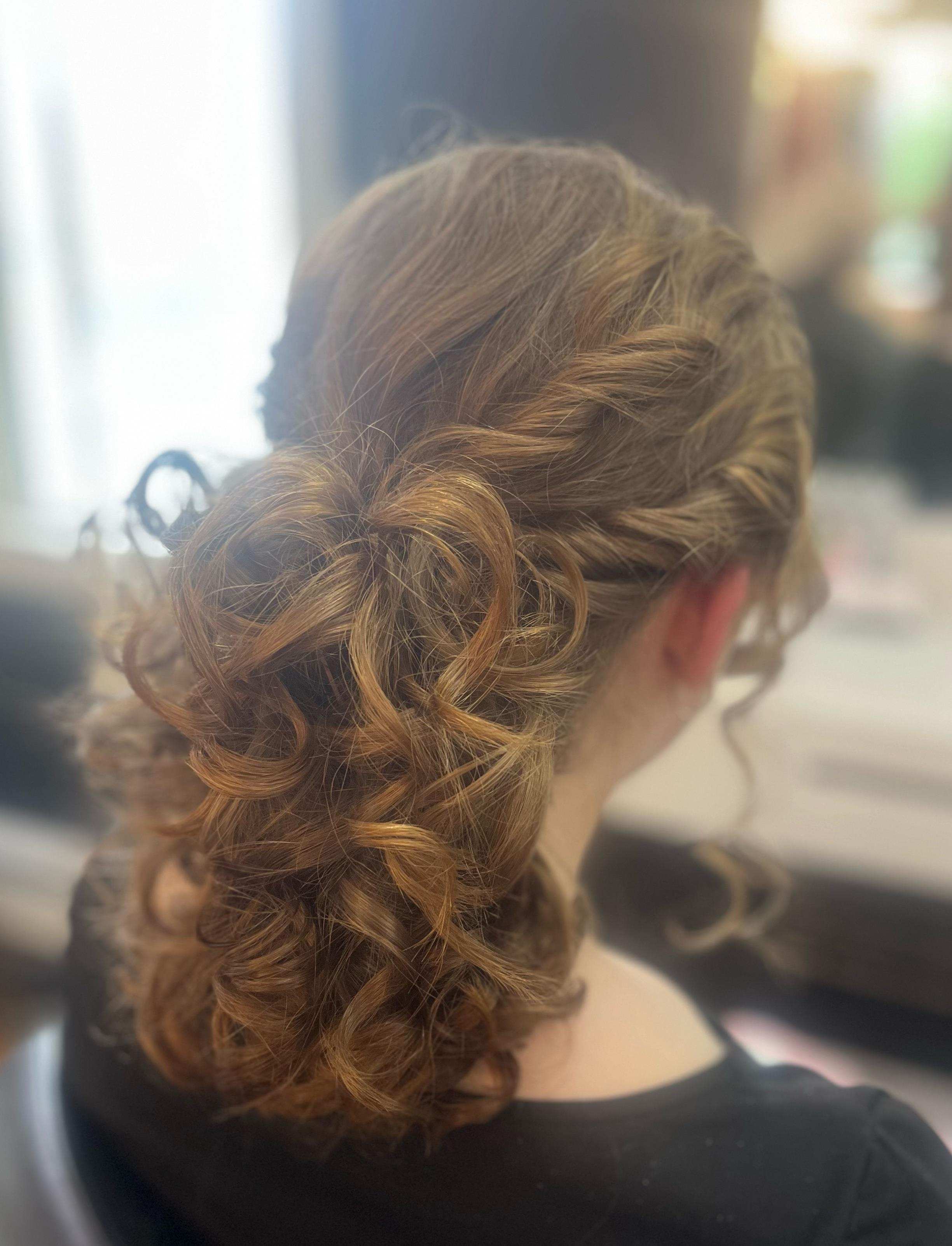 Elegant braided updo with curls